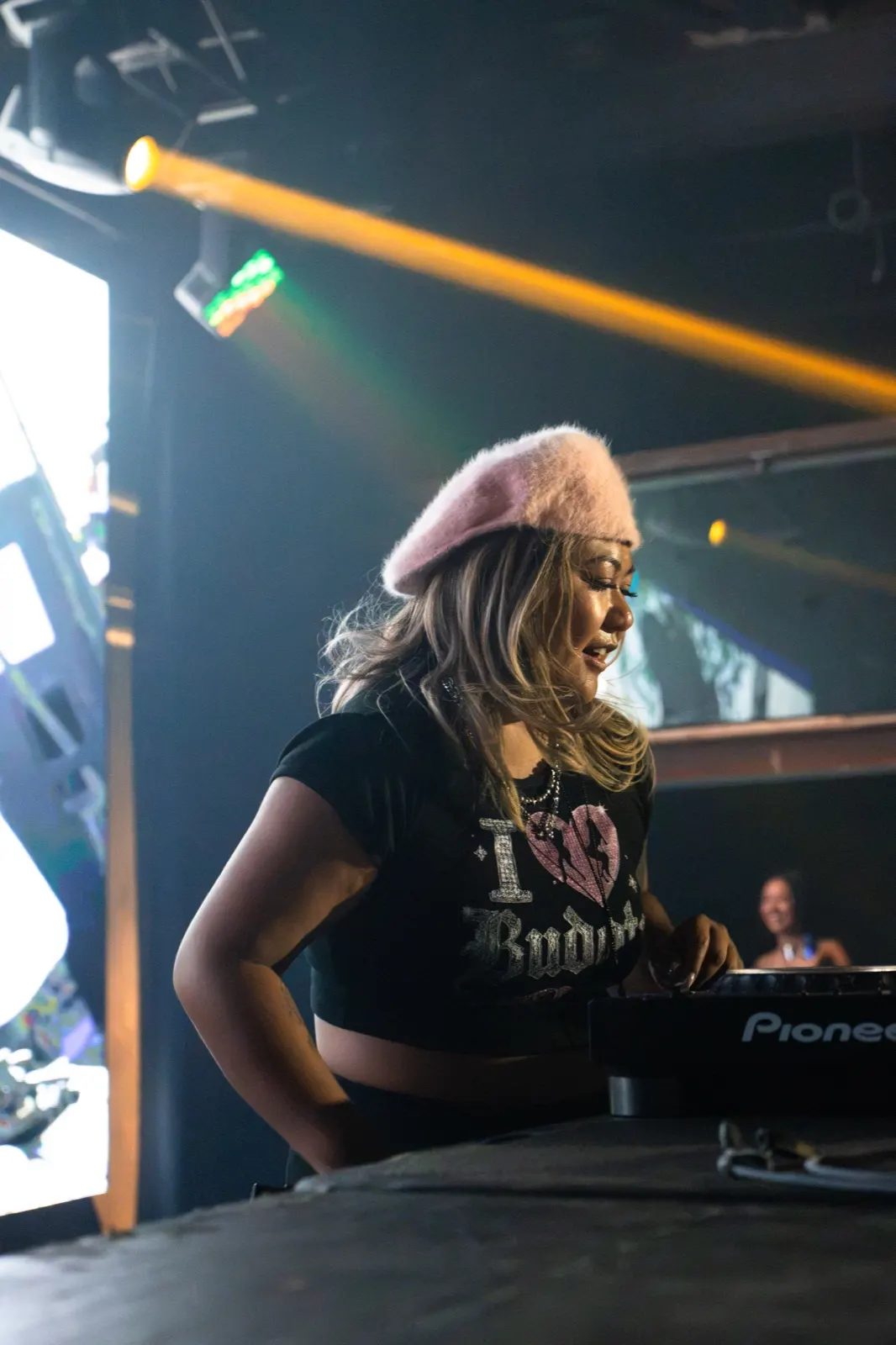 DJ Trixy mid-set at the Pioneer decks, The Midway